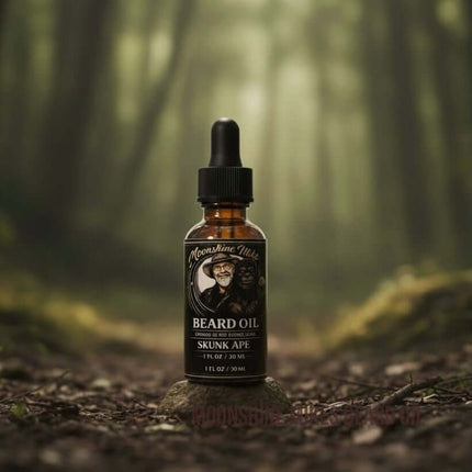 Moonshine Mike's Skunk Ape Beard Oil bottle on a kitchen countertop with modern decor.